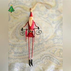 Festive Red Long Santa Ornament Holding Hearts
